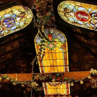 a stained glass window in the ceiling