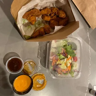 Chicken bites and salad