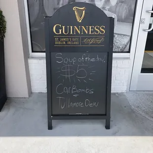 a sign outside a bar