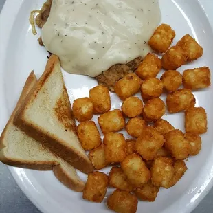 One of Ellsworth's favorite Dishes, Chicken Fried Steak.  They are hand breaded and cooked on a flat top, the way it should be.
