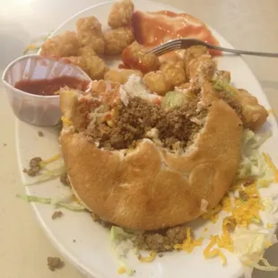 Sorry I was too hungry tI wait. But I got a taco burger and the best tater tots I've ever had. In.... Wait where am I?