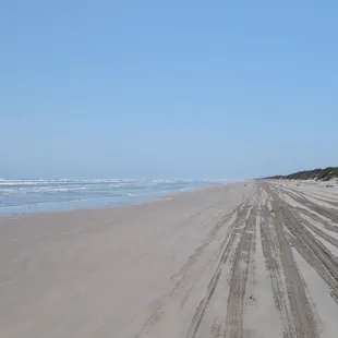 The extremely high tide at 2 am is going all the way to the dunes. You can see the wet sand left behind I'm navigating