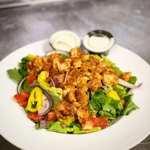 a white plate with a salad on it