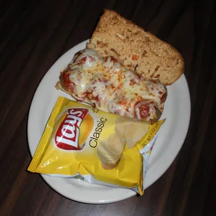 a bag of chips and a slice of pizza