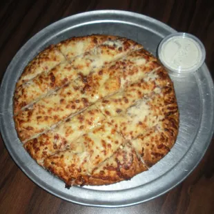 a cheese pizza on a pizza pan