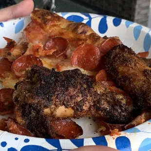 Pizza and the over seasoned dry rub wing.