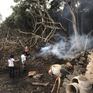 Burning the branches.. please donate or volunteer to help live self sustainable