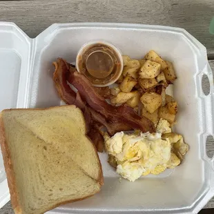 Eggs, bacon potatoes and toast
