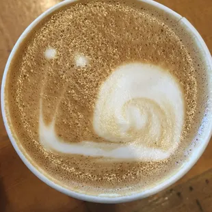 Cute little snail on the top of my latte this morning, love barista art! #silvercupcoffee