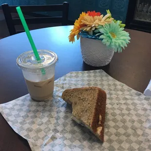 Iced chai tea latte and the remaining half of a cranberry chicken salad sandwich!