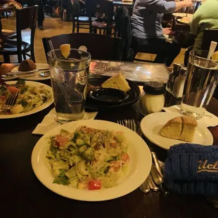 Our house salad upgrades, paired nicely with hearty and delicious bread served with olive oil dipping sauce :) !