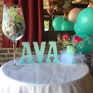 Had 3 cocktail tables set up around the room for people to stand around and for us to decorate