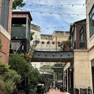 a pedestrian bridge over a street