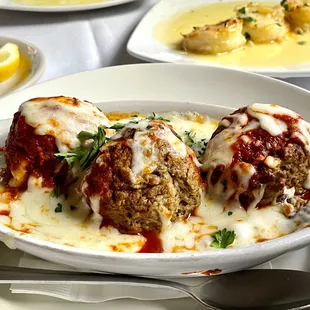 Meatballs were really tender and very good. Shrimp Paesano* in background