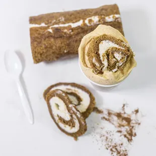 a cup of ice cream and a piece of cake