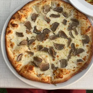 Black Truffle Cheese Pizza w/o mushrooms. Fantastic.