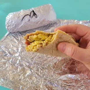 Bacon breakfast tacos on corn.