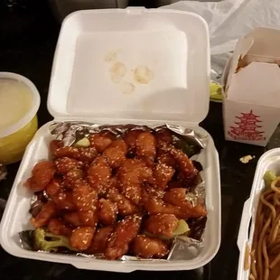 Sesame chicken (the container of rice top right)