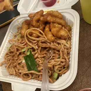 Lemon chicken/chowmein plate with some eaten egg roll. Lol