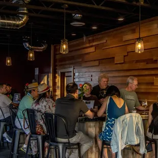 people sitting at a bar