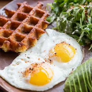 Cheesy Wafflato + Avocado + Eggs: Smoked Mozzarella | Caramelized Shallots | Arugula Salad