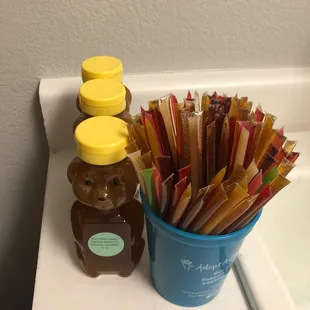 a bear and a jar of honey