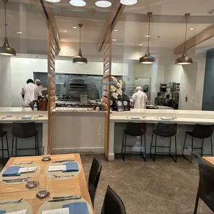 Chefs kitchen open to the dining room.