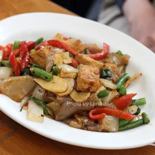 Small Pad Kee Mao Tofu ($13.95) - flat noodles, string beans, basil, bamboo, white onions, tomato