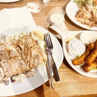 Garlic ahi on a bed of coleslaw with side partner calamari fries