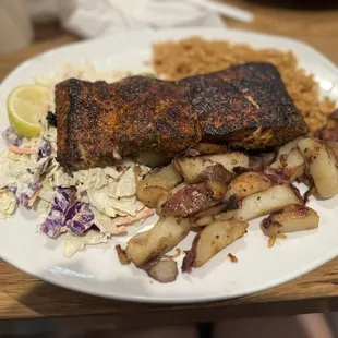 Blackened Mahi mahi with rice + home potatoes