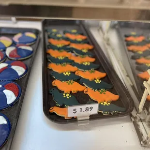 two trays of decorated cookies
