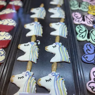 a variety of decorated cookies