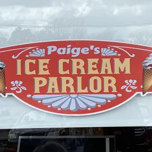 a sign for the ice cream parlor