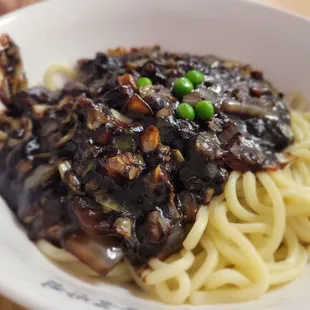 Jajangmyeon Noodle dish for $10.95 Noodles with a sweet and savory black bean sauce, pork and vegetable.