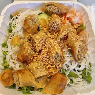 a salad in a styrofoam container