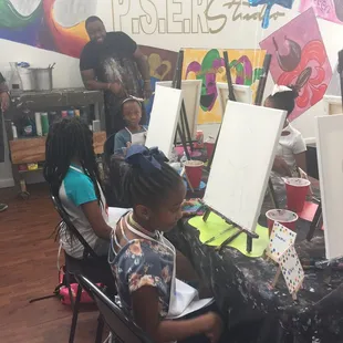 Owner talking with kids