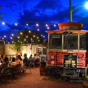 a red trolley at night