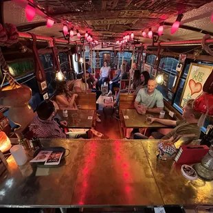 people sitting at a bar