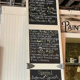 menus on the wall of a restaurant
