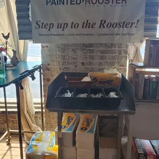 a table with a sign on it