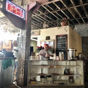 Mama working on the coffee station.