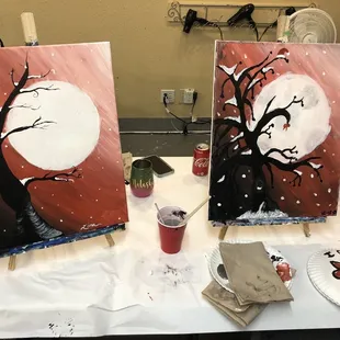My painting on the left and my fiancé's on the right!!