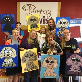 Celebrating my mother's 78th birthday with grandchildren and great-grandchildren painting our puppy, Edward.