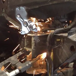 Fully equipped for accurate repairs (factory weld being replaced with our resistance spot welder)