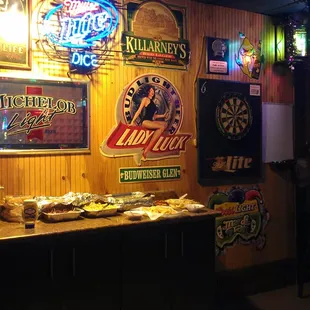a bar with neon signs