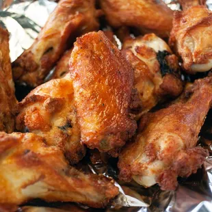 a pile of chicken wings