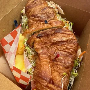 Chicken with honey mustard on a croissant