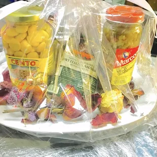 a plate of food wrapped in plastic