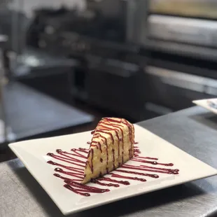 Lemoncello Mascarpone with Raspberry drizzle