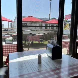 a table with a red and white checkered tablecloth